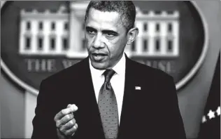  ??  ?? President Barack Obama speaks to reporters Friday in the Brady Press Briefing Room at the White House in Washington after meeting with Congressio­nal leaders regarding the fiscal cliff.