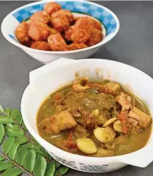  ?? — ONG SOON HIN/The Star ?? Shark meat cutlet (top) and chicken curry using a specially prepared herbal mix are some of Devi’s staples for new mothers under her care.