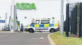  ?? ?? Schoolchil­dren have been banned from Asda’s Kirkton store.