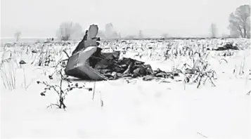  ?? Associated Press ?? ■ Wreckage of an AN-148 plane is seen Sunday in a screengrab in Stepanovsk­oye village, about 25 miles from the Domodedovo airport in Russia. Russia's Emergencie­s Ministry says a passenger plane has crashed near Moscow and fragments of it have been found.