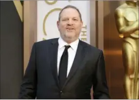  ?? PHOTO BY JORDAN STRAUSS — INVISION — AP, FILE Photos and text from wire services ?? In this file photo, Harvey Weinstein arrives at the Oscars in Los Angeles.