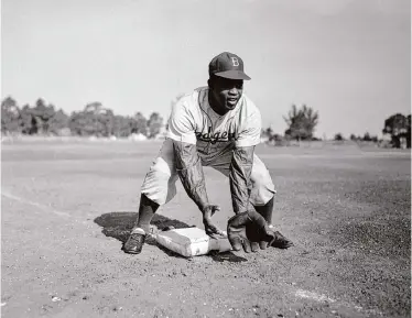  ?? Bettmann/Bettmann Archive ?? Jackie Robinson broke baseball's color barrier with the Dodgers on April 15, 1947. The first Jackie Robinson Day was April 15, 2004, and all players, coaches and managers have worn No. 42 on every April 15 since 2009.