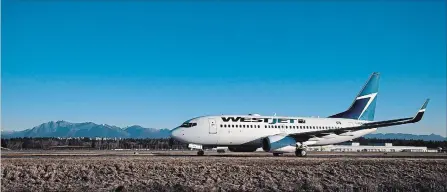  ?? DARRYL DYCK THE CANADIAN PRESS ?? The Federal Court has ordered WestJet along with Swoop to provide the Competitio­n Bureau with pricing and other records including emails.