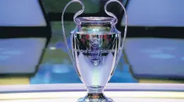  ?? AP ?? The Champions League trophy is displayed before the UEFA group stage draw at the Grimaldi Forum, in Monaco, Thursday, August 29, 2019.