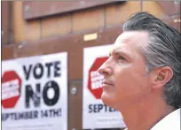  ?? GENARO MOLINA — LOS ANGELES TIMES/TNS ?? California Gov. Gavin Newsom meets with Latino leaders to vote no on the recall at Hecho en Mexico restaurant in East Los Angeles on Aug. 14, 2021.