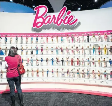  ?? STAN HONDA AFP/GETTY IMAGES ?? Mattel plans to turn many of its beloved brands, including Barbie, into movies, TV series and video games.