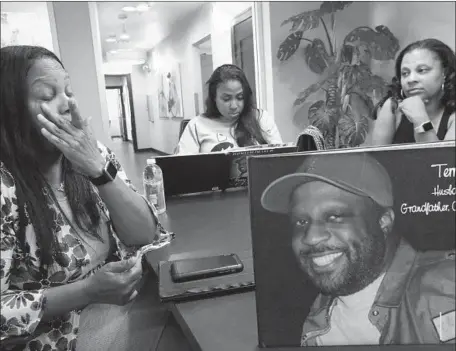  ?? Genaro Molina Los Angeles Times ?? LILLIAN CARTER, left, remembers her late husband with daughters Crystal and Nekaya. Whether it was through his work in music, the auto industry or at home, Terry Carter, 55, developed a reputation as someone dedicated to uplifting those closest to him.