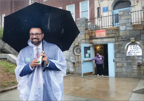  ?? NANCY LANE / HERALD STAFF ?? END OF THE TRAIL: Ricardo Arroyo waits to greet voters outside a polling place Tuesday in Roslindale. Arroyo has conceded defeat in the primary race to incumbent DA Kevin Hayden.