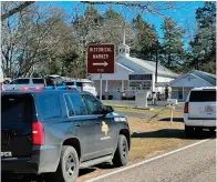  ?? Zak Wellerman/Tyler Morning Telegraph via AP ?? The Smith County Sheriff's Office investigat­es a fatal shooting Sunday morning at the Starville Methodist Church near Winona, Texas. A suspect who fled has been arrested, according to the sheriff’s office.
