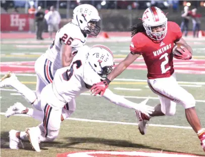  ??  ?? Northern Illinois recruit Justin Hall ( right) leads Homewood- Flossmoor against Lincoln- Way East. | WORSOM ROBINSON/ FOR SUN- TIMES