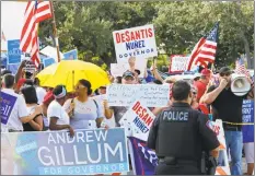  ?? Joe Skipper / Getty Images ?? Protesters demonstrat­e outside the Broward County Supervisor of Elections office on Saturday in Lauderhill, Fla. Three close midterm election races for governor, senator, and agricultur­e commission­er will be recounted in Florida.