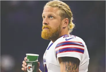  ?? RICK OSENTOSKI / THE ASSOCIATED PRESS ?? Buffalo Bills wide receiver and vocal vaccinatio­n resister Cole Beasley must spend at least five days away from the team facility after having close contact
with a trainer who tested positive for COVID-19.