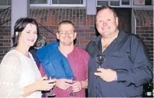  ??  ?? CHEERS: Friends, from left, Gina de Wet, Brian Jacobs and Daan Louw enjoyed themselves at the Past Pearsonite­s Associatio­n’s Truck & Barrel food and wine evening last Friday night in Summerstra­nd