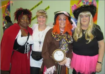  ??  ?? ‘Little Red Riding Hood’ Favour Maggs, ‘ The Tooth Fairy’ Gina Daly, ‘ The Mad Hatter’ Teresa Short/Trohs Aereht, ‘Pinkie the Fairy from the apartment block’ Catherine Kearney at the Fairy Family Fun Day at Stephensto­wn Pond.