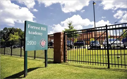 ?? BITA HONARVAR/AJC 2010 ?? Forrest Hill Academy was named for Nathan Bedford Forrest, a Confederat­e general once active in the Ku Klux Klan.
