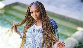  ?? Chris Pizzello / Associated Press ?? Singer/actress Brandy poses for a portrait in Calabasas, Calif., earlier this month to promote her album “B7.”