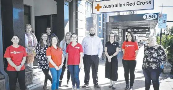  ?? Picture Bev Lacey ?? MOVING IN: Australian Red Cross has relocated to 154 Margaret Street. Outside their new offices are (back row) Charlene Keller (left) and Karla Draper, (second row) Sarah Berardo and Tiaro Cyrnock, (front, from left) Zeynad Aria, Mary-Ellen Middleton, Tahlia Bligh, Luke Yuginovich, Jade Stanley, Abigail Eberhard and Teagan McDonald.