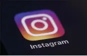  ?? JENNY KANE — THE ASSOCIATED PRESS FILE ?? The Instagram app icon on the screen of a mobile device in New York.