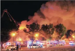  ?? PICTURE: AP ?? A raging fire burns on Independen­ce Boulevard near Prospect in Kansas City, Missouri, on Monday.