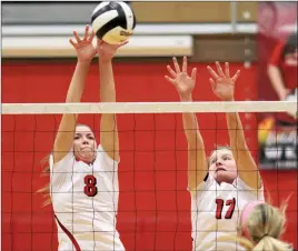  ?? PILOT PHOTO/RUDY MARQUEZ ?? Plymouth’s Taylor Delp gets the block with teammate Miranda German.