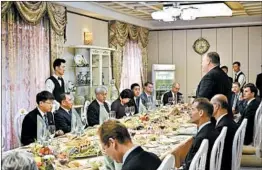  ?? MATTHEW LEE/AP ?? Secretary of State Mike Pompeo, standing, makes a statement during a dinner between American diplomats and North Korean dignitarie­s Wednesday in Pyonyang, the capital.