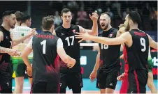  ?? WAYNE CUDDINGTON ?? Team Canada players, Stephen Timothy Maar, from left, Tyler Sanders, Graham Vigrass, Bradley Robert Gunter, and Jason Derocco celebrate a point during their Friday win over Australia at TD Place.