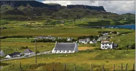  ??  ?? Houses in Staffin Bay, Skye. The study found Scotland exhibited one of the most concentrat­ed patterns of private land ownership in the world