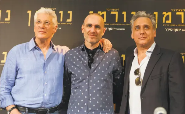  ?? Dan Balilty / Associated Press ?? Richard Gere (left), Israeli writer-director Joseph Cedar and actor Lior Ashkenazi attend the March premiere of “Norman” in Jerusalem.