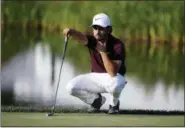  ?? MICHAEL DWYER — THE ASSOCIATED PRESS ?? Abraham Ancer waits to putt on the 16th hole during the third round of the Dell Technologi­es Championsh­ip golf tournament at TPC Boston in Norton, Mass., Sunday.