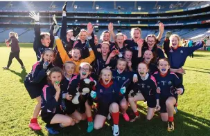  ?? DAVID FITZGERALD/SPORTSFILE ?? Scoil Santain Tamhlacht players celebrate following their victory over St Damian’s NS, during day three of the Allianz Cumann na mBunscol finals at Croke Park