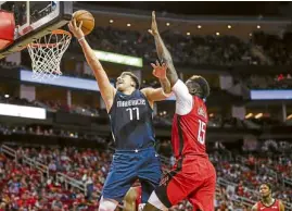  ?? —USA TODAY SPORTS ?? There was simply no stopping Mavericks star Luka Doncic, who lorded it over Clint Capela and the Rockets.