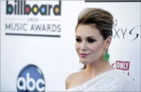  ?? ASSOCIATED PRESS ?? In this 2013 photo, Alyssa Milano arrives at the Billboard Music Awards at the MGM Grand Garden Arena in Las Vegas. Thousands of women responded to Milano’s call on Oct. 16 to tweet “#metoo” in order to raise awareness of sexual harassment and assault...