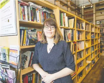 ?? FRANCIS GEORGIAN ?? Patricia Massy, of Massy Books in Vancouver’s Chinatown, says she sold more books online in June than in all of last year. Massy started a free delivery service and has hired three more employees.