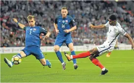  ??  ?? Marcus Rashford fires home England’s winning goal.