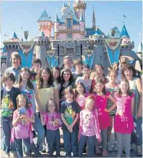  ??  ?? FACADE: All the children were present, seemingly happily, when the couple renewed their marriage vows in 2015, above. A trip to Disneyland also depicts the family as being close and loving, left