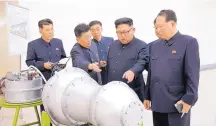  ??  ?? This undated image distribute­d Sunday by the North Korean government shows North Korean leader Kim Jong Un at an undisclose­d location. North Korea’s state media said leader Kim inspected the loading of a hydrogen bomb into a new interconti­nental...