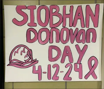  ?? SENTINEL & > ENTERPRISE / NICK MALLARD ?? A sign for Siobhan Donovan Day hangs in Memorial Middle School on Friday.