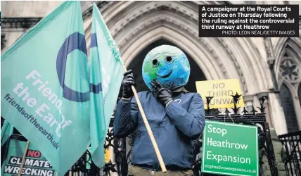  ?? PHOTO: LEON NEAL/GETTY IMAGES ?? A campaigner at the Royal Courts of Justice on Thursday following the ruling against the controvers­ial third runway at Heathrow
