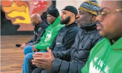  ?? KARL MERTON FERRON/STAFF ?? Richard Lewis, center, talks during an interview at Langston Hughes Community Center with life coaches from We Are Us as part of the Department of Juvenile Services’ new Thrive Academy program.