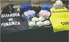  ??  ?? More bogus kits and masks uncovered by police in Italy.