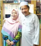  ??  ?? AJIJAH bersama suami Abdul Gapar bertugas di Hospital Keningau.