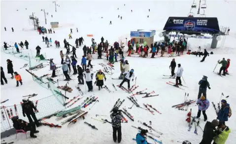  ?? ?? Skiers slide on a snow slope at the Lebanese ski resort of Faraya, in Mount Lebanon north of Beirut, on February 23, 2024. — AFP photos