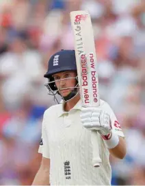  ?? –Reuters ?? CAPTAIN’S KNOCK: England’s Joe Root celebrates his half century durin the first test against at Edgbaston, Birmingham,