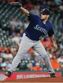  ?? Associated Press ?? Seattle Mariners starting pitcher James Paxton delivers in the first inning of a baseball game against the Houston Astros on Wednesday in Houston.