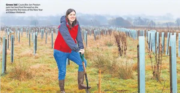  ?? ?? Green bid Councillor Jen Preston puts her best foot forward as she planted the first trees of the New Year at Kildean Wetlands