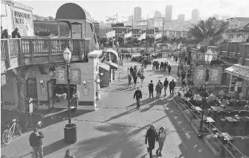  ??  ?? File photo shows the Coit Tower & Transameri­ca Pyramid seen from Pier 39 at San Francisco Fisherman Wharf. — AFP photo