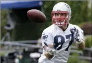  ?? STEVEN SENNE — ASSOCIATED PRESS FILE ?? Patriots tight end Rob Gronkowski, catching a pass during a minicamp practice, in Foxborough, Mass., in June, remains one of Tom Brady’s top targets.
