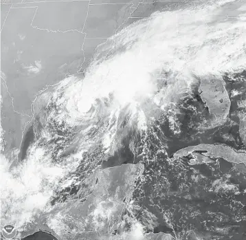  ?? NOAA ?? A satellite image Saturday shows Tropical Storm Beta in the Gulf of Mexico. Beta is expected to make landfall this week.