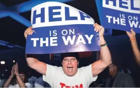  ?? NATHAN DENETTE THE CANADIAN PRESS ?? An Ontario PC supporter reacts after the PC's reached a majority in the Ontario Provincial election at the Doug Ford election night headquarte­rs in Toronto, Thursday night.