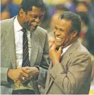  ?? MIKE KULLEN/ASSOCIATED PRESS FILEW PHOTO ?? Former Celtics teammates Bill Russell, left, and K.C. Jones meet in 1988. Both where coaches then; Russell with the Kings and Jones with the Celtics.